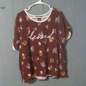 Burgundy tee shirt with the word blessed on the front,